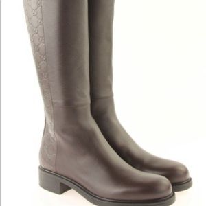 Gucci leather riding boots.